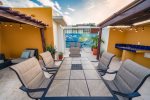 Your private roof deck with lounge chairs, patio table, BBQ, outdoor shower and pool view